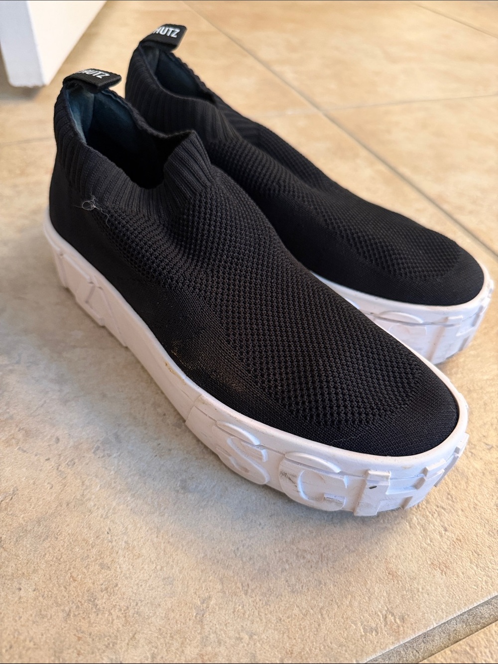 Women's black knit slip-on shoes with chunky sole
